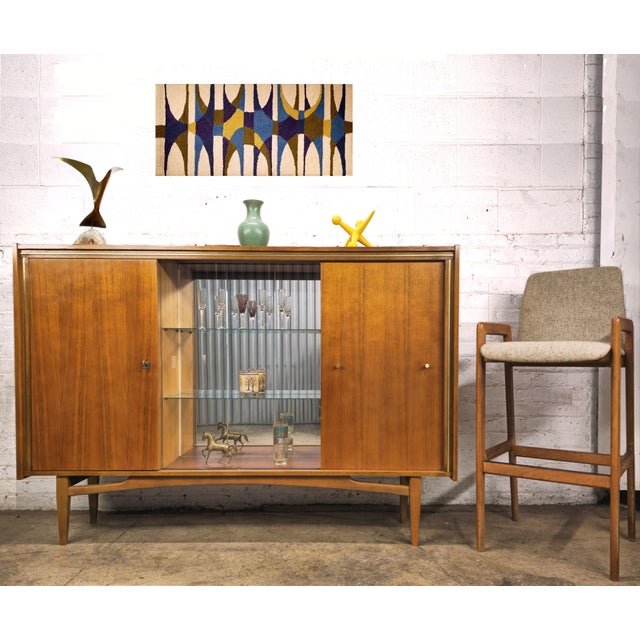 A slim, multi-functional, Danish modern mid century teak Sideboard sutable for a Barcabinet, Record Cabinet , Buffet, etc....
