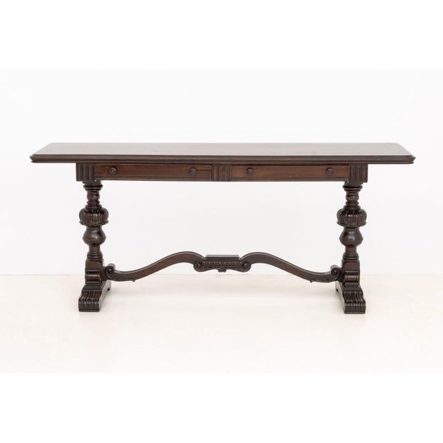 Renaissance Revival Mahogany Trestle Table, with two drawers above two supports conjoined by H-forn stretcher and four...