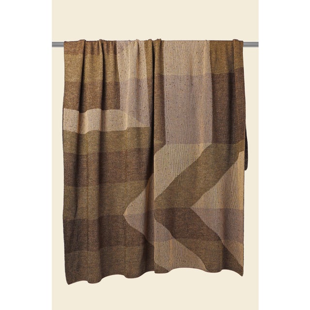 Soft, breathable, and designed to move effortlessly between seasons, this knitted blanket is made from a luxurious blend...