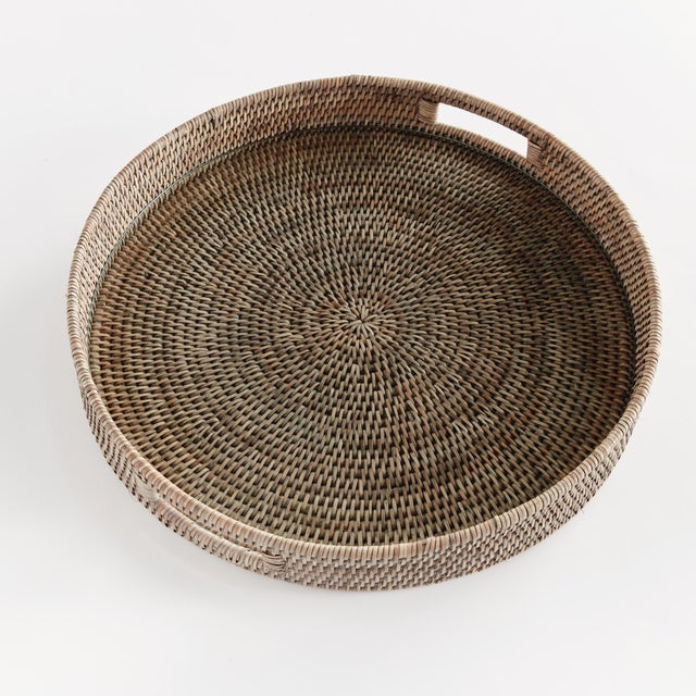 Our Burma Rattan Serving Tray in a graywash finish is a great way to serve your favorite crudites. With impeccable...