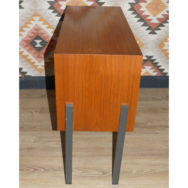 Stylish furniture in a straightforward design. Small cabinet with a drawer and folding point. Stable wooden corpus real...