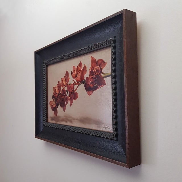 This artwork presents a delicate arrangement of Cymbidium orchids, rendered with meticulous attention to detail on an...