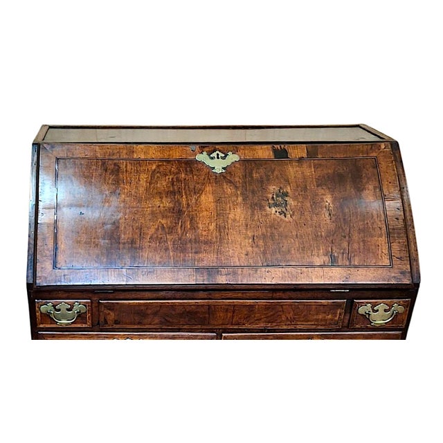 This is an exceptional example of an English George I / Queen Anne-style period walnut bureau-desk that's ready to...
