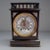 This listing is for a gorgeous antique French mantel clock. It is made in the Aesthetic style from wood with inset...