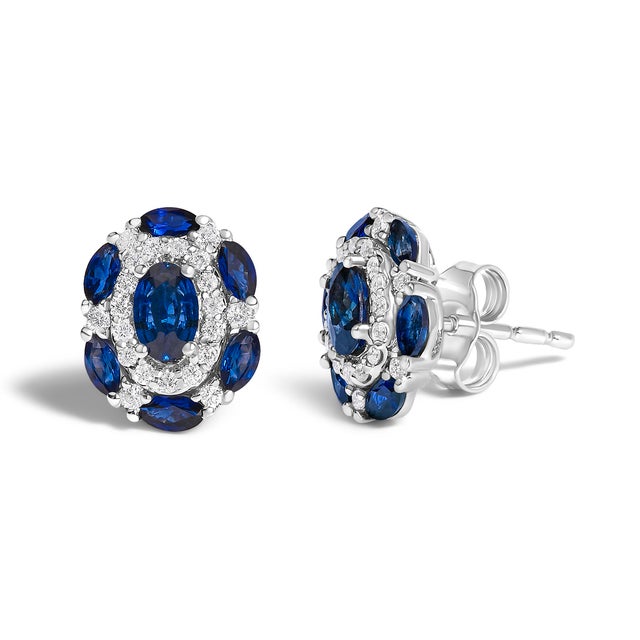 Discover elegance that whispers tales of timeless romance with these exquisite stud earrings, crafted from lustrous 14K...