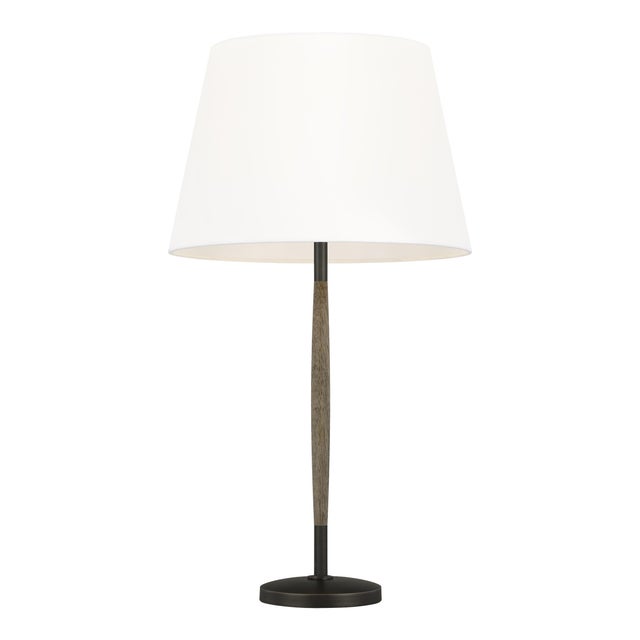 The Ferrelli one light table lamp in weathered oak wood is the perfect way to achieve your desired fashion or functional...