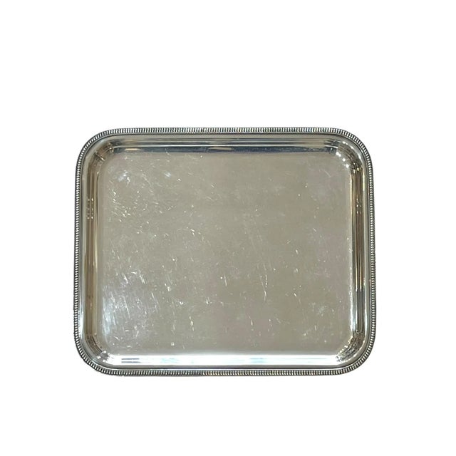 Beautiful French silver plate tray with an illegible makers mark and the number 14 engraved on the back. Pattern is...
