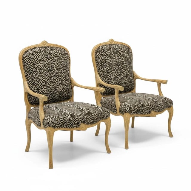 This is a pair of Italian bergère chairs. The faux bois frames are carved pine, and the upholstery, although not new, is...