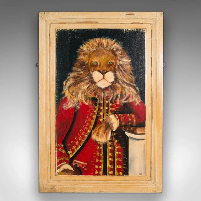 This is a vintage lion portrait. An English, oil painting on reclaimed Victorian pine, dating to the late 20th century,...