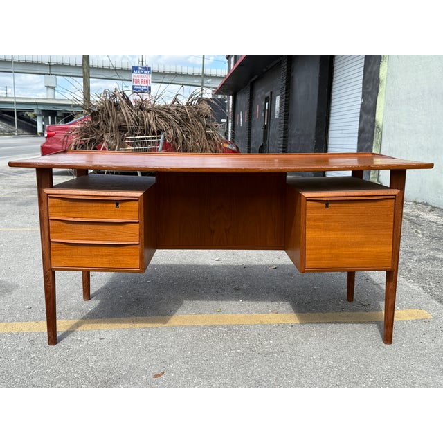 1960's Peter Lovig Nielsen Danish Modern Floating Top Executive Desk with original finish sold as found in good condition...