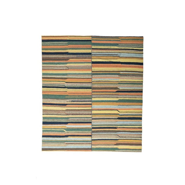 A vibrant, handwoven kilim from the Fars region – with striking, interlocking striped patterns in yellow, orange, blue,...