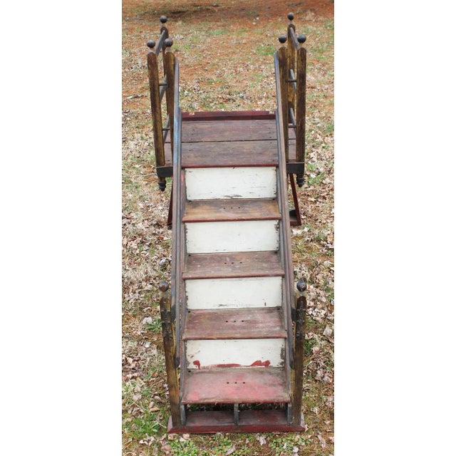 Pegged construction, with delightful turned finials and other details. Retaining its original worn and alligatored red,...