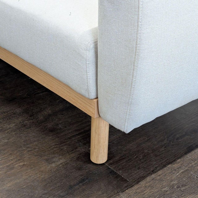 Modern 3-Seat Sofa With Light Wood Base and Cream Upholstery For Sale - Image 9 of 9