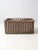 This antique wicker basket features a rectangular form with rich, handwoven texture and a braided rim that adds subtle...