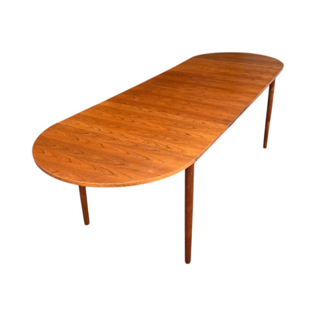 This beautiful 1960s Danish Modern extendable dining table embodies the timeless elegance and functional simplicity that...