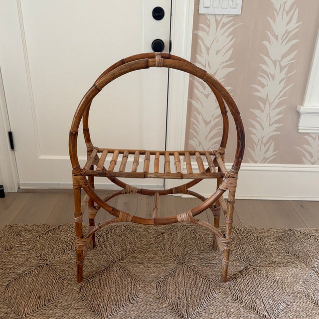 Wonderful midcentury bamboo/rattan circular shelf unit for display of books, plants or other decorative objects. Great...