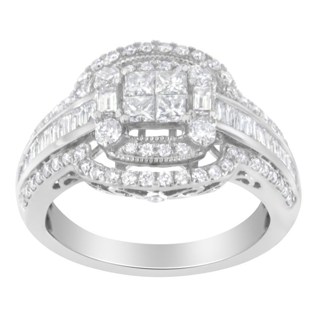 This diamond cocktail ring is designed with a vintage style and features a central square cluster of four princess cut...