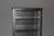 Iron display cabinet with a black patina, glazed on three sides, opens with a door, four fixed glass shelves, interior...
