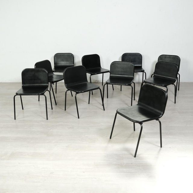 Set consisting of 10 chairs with an interesting 70s and 80s design. Structure in black painted metal tubing, seat and...