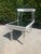 An iconic slice of Hollywood Regency history. This two-tiered end table was designed by Lorin Jackson for Grosfeld House's...