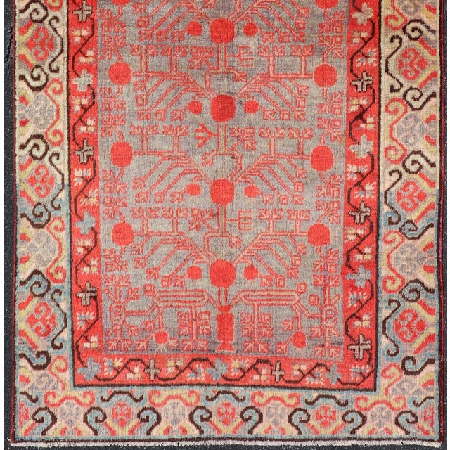 Textile Ntricate Vintage Khotan Rug With Sub-Geometric Design in Reds and Light Blue For Sale - Image 7 of 10