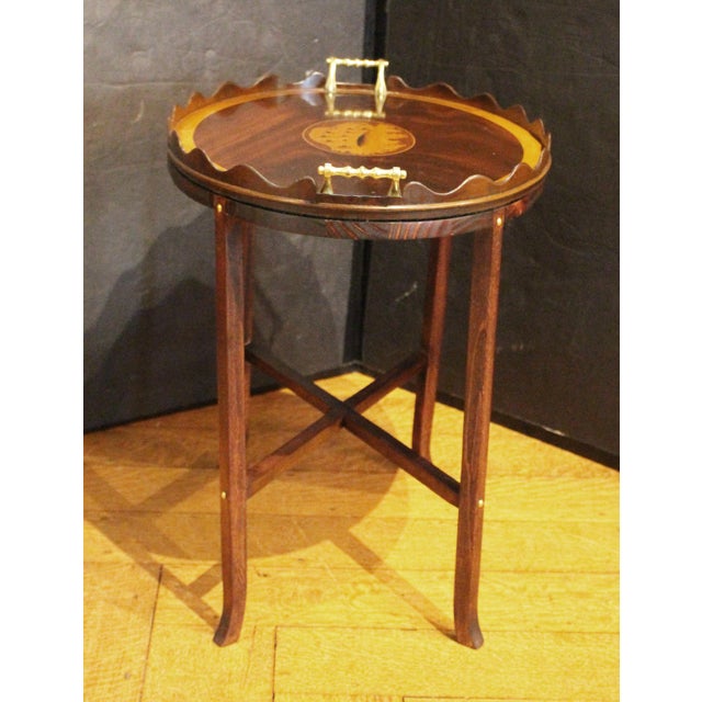 Circa 1880s English oval gallery tray on custom coffee table height stand. Scalloped gallery tray with large central conch...