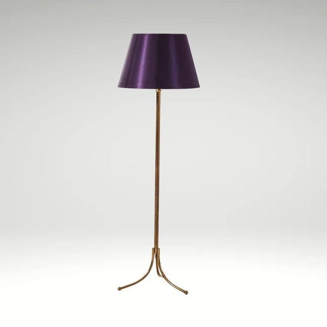 A beautifully designed floor lamp by Josef Frank, model G2326, produced by Svenskt Tenn in Sweden. This rare piece...