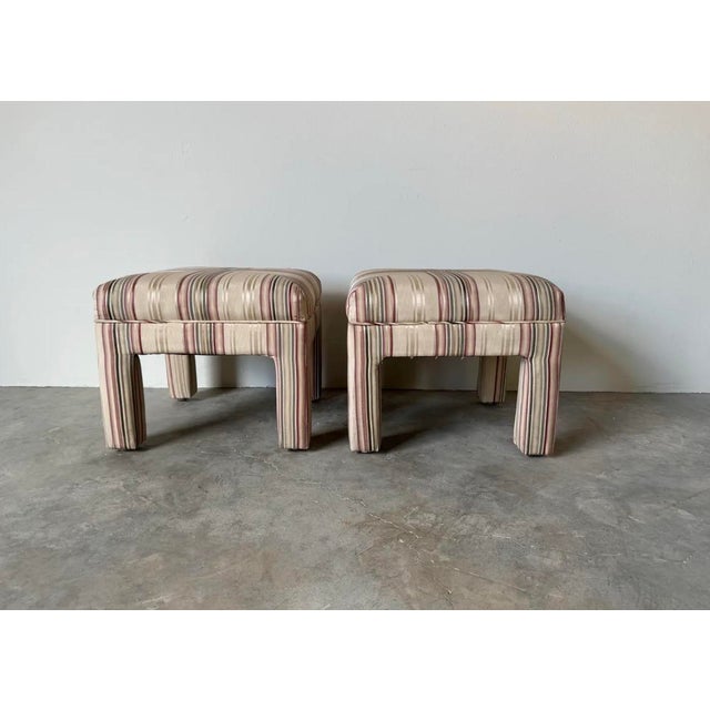 Striking pair of Mid-Century modern Parsons upholstered stools - ottomans in the style of Milo Baughman, circa 1980s....
