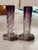 Elegant pair of crystal vases with a violet–amethyst gradient, finely wheel-cut with a stylized floral design. The...