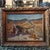 An Orientalist oil on canvas painting by Mathilde Lenoir. Features a scene of a Bedouin family in a desert, interacting...