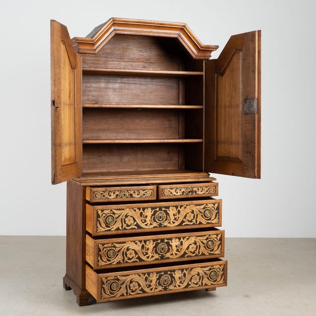 Early 19th century Danish cabinet, crafted in oak with highly detailed inlay and marquetry throughout. Elaborate...