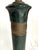 A tall brass floor lamp made by Frederick Cooper. Asian Regency. There are bands of engraved scenes around each node with...