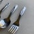 Vintage midcentury set of 4 stainless steel baby fork 1, baby spoons 3 , makers mark reads " INSICO STAINLESS USA"...