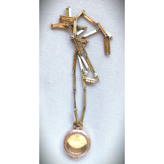 Antique Etched Round Art Deco 1920's 10K Gold-Plated Wrist Watch--Turned Locket--hangs on a 20.0 inch gold-plated edged...