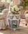 A classic Chinoiserie blue, white, pink, and green porcelain garden stool, plant stand, or small side table decorated with...