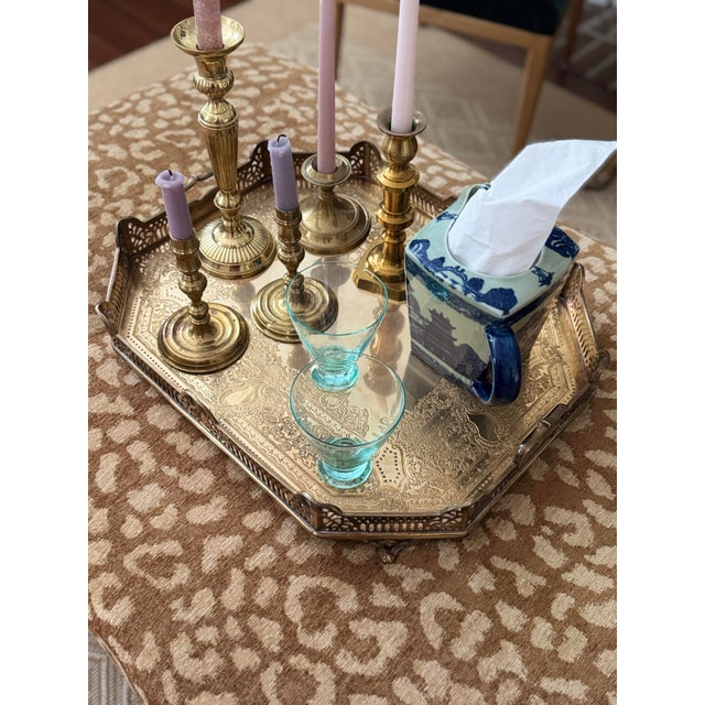 Stunning and large! This is a large engraved brass tray with handles and feet. Amazing piece for display or use. Signs of...