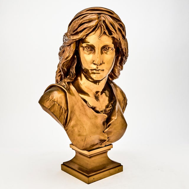 This elegant antique French gilt and polished bronze bust sculpture of a woman was crafted in Paris during the 19th...