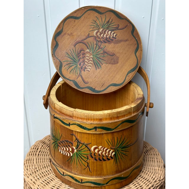 Store kindling, pinecones, matches and more next to your fireplace with this vintage lidded sugar bucket. Add a mountain...