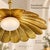 # Handmade Brass Flower Chandelier – Hammered Floral Pendant Light **Bring the beauty of handcrafted floral design into...