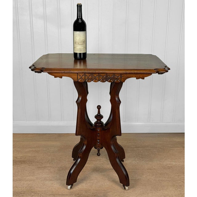 An Early 20th Century Eastlake Victorian Parlor Table Dark Satin Finished Solid Walnut with Wonderful Graining Decorative...