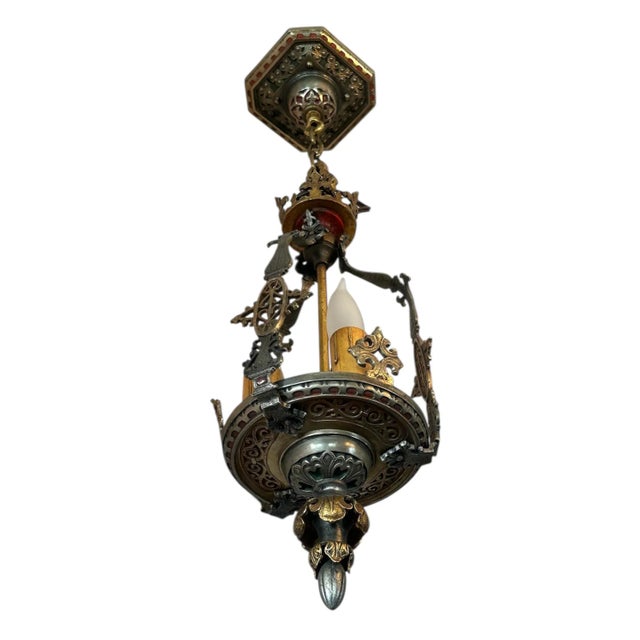 This three light chandelier belongs in your entryway! All original old aunts have a wonderful patina. Gold, pewter, reds...