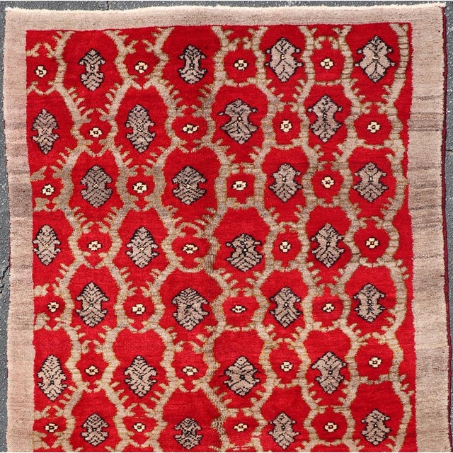 Vintage Turkish Tulu rug with a modern design in red background in excellent condition with soft and fine wool. All-over...