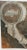This extra-large wooden printer's ink block features a hand holding a magnifying glass, fashion mirror, showcasing a...