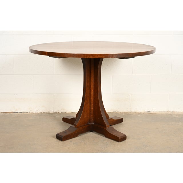 A gorgeous Mission oak Arts & Crafts pedestal center table, breakfast table, game table, or dining table By Stickley USA,...