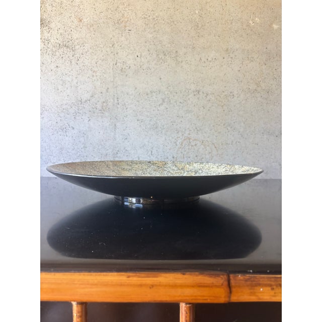 A striking vintage decorative centerpiece bowl featuring an intricate eggshell mosaic surface in warm ivory, cream, black...