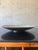 A striking vintage decorative centerpiece bowl featuring an intricate eggshell mosaic surface in warm ivory, cream, black...