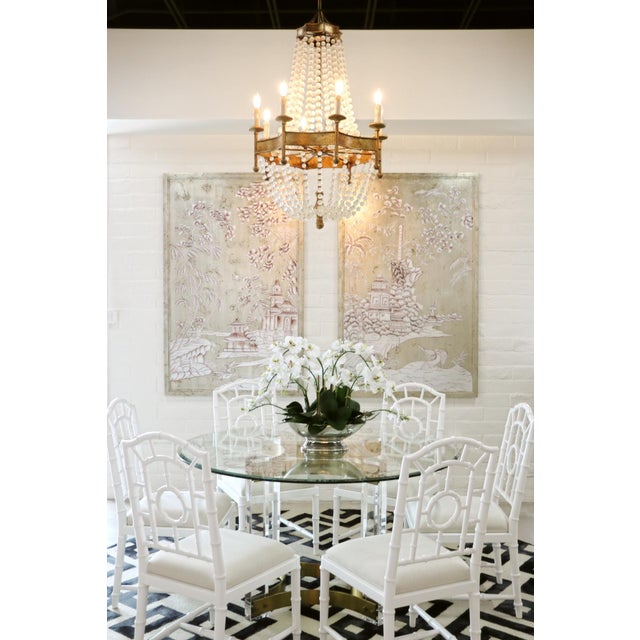 Add timeless elegance to your interior with this hand-painted wood panel, showcasing a graceful chinoiserie design in gold...