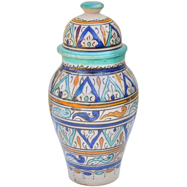 Lovely one-of-a-kind antique Moroccan ceramic lidded vase accent, thoughtfully handcrafted and glazed in a sleek...