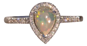 The 29th Avenue: Natural Opal and Diamond Halo Ring in White Gold