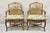 Vintage French Country Louis XV Style Upholstered Cane Stretcher Base Lounge Arm Chairs - a Pair. Circa Mid 20th Century....